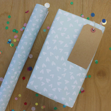 White hearts on blue gift wrap - Daisy Park